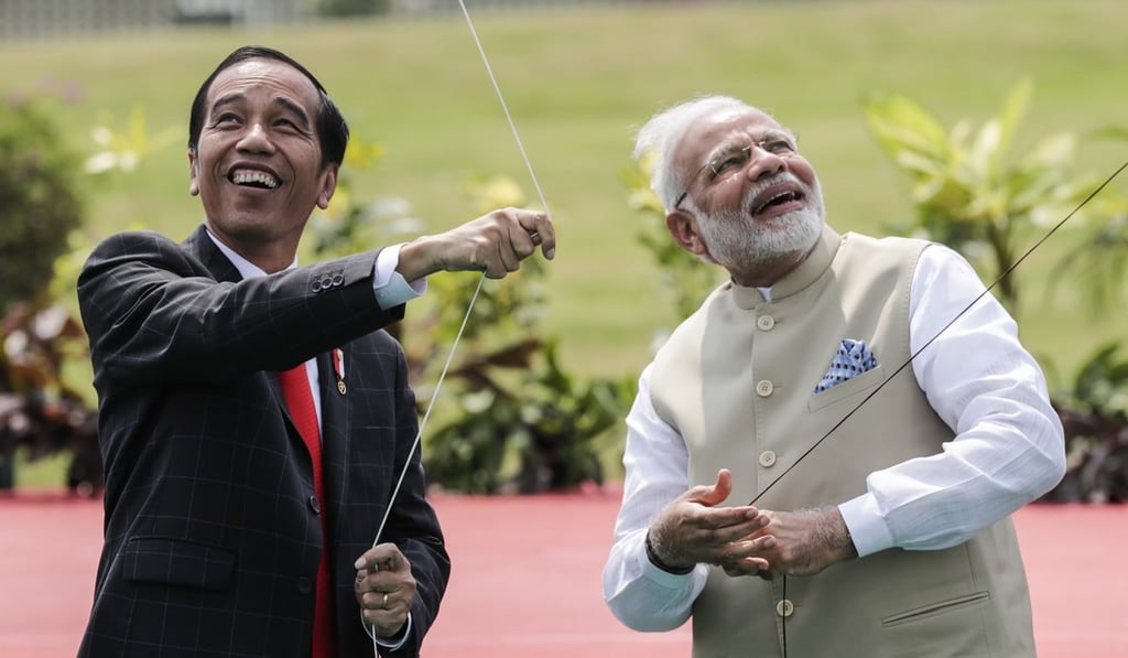 Indonesian President Joko Widodo (left) and Indian Prime Minister Narendra Modi fly kites during the opening ceremony of the India-Indonesia Kite Exhibition at the National Monument in Jakarta, Indonesia, on May 30. India and Indonesia have the largest current account deficits in Asia. Photo: EPA-EFE