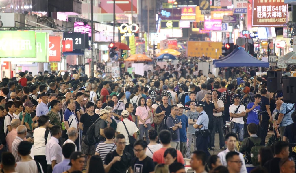 Vibrant and colourful, but noisy and a nuisance to residents, the ending of the pedestrianised zone in Mong Kok is not unpopular with everyone: Photo: Felix Wong