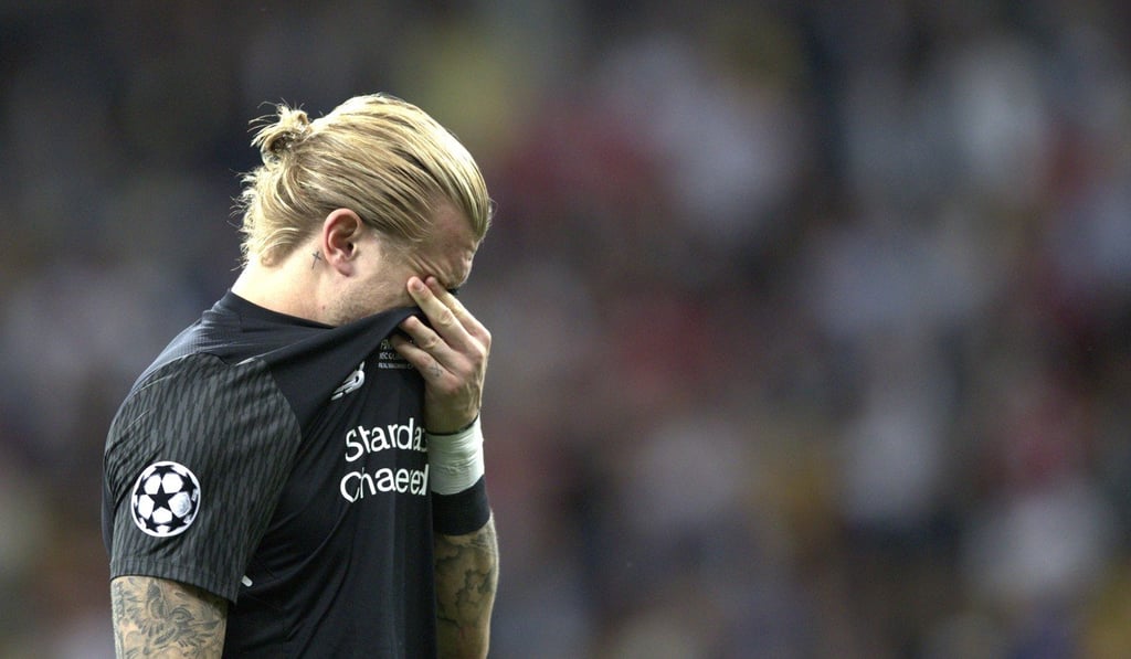 Liverpool goalkeeper Loris Karius was elbowed in the head by Sergio Ramos during the final. Photo: EPA