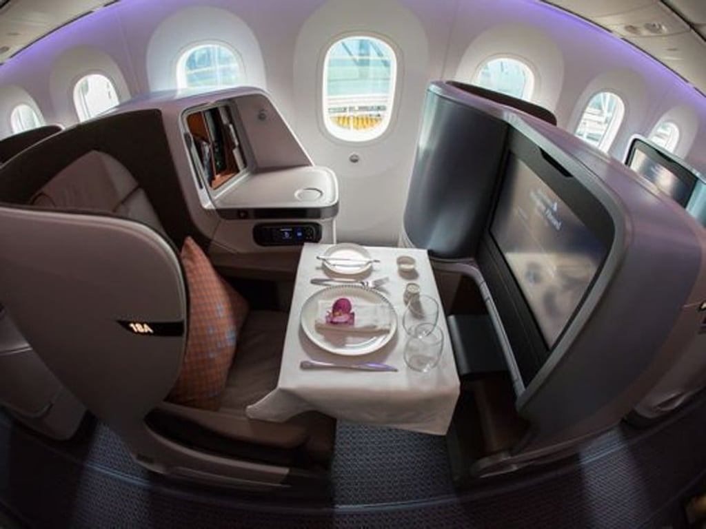 Flying business class with any airline can cost more than four times the price of an economy class ticket. (Above, a Singapore Airlines’ business class cabin.) Photo: Jeremy Dwyer-Lindgren