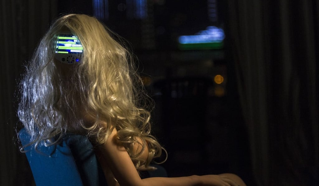 An AI sex robot with a screen in its head is seen on display at the Shenzhen Atall Intelligent Robot Technology show room in Guangzhou. Photo: EPA