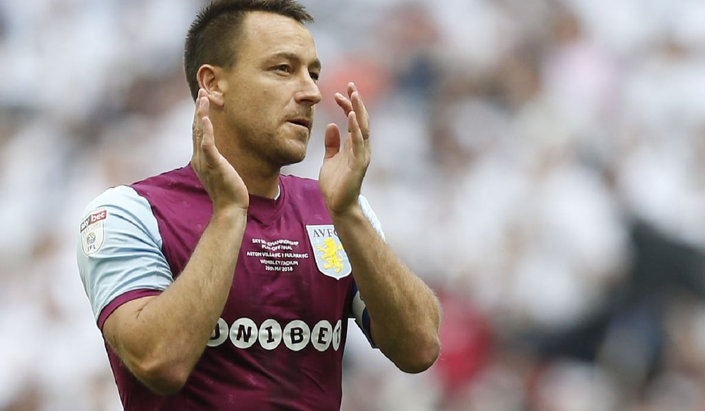 Former England captain John Terry leaves Wembley after the play-off defeat. Photo: AFP