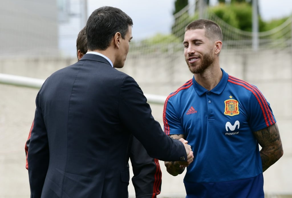 Sergio Ramos (right) meets new Spanish prime minister Pedro Sanchez during training at Las Rozas de Madrid. Photo: AFP