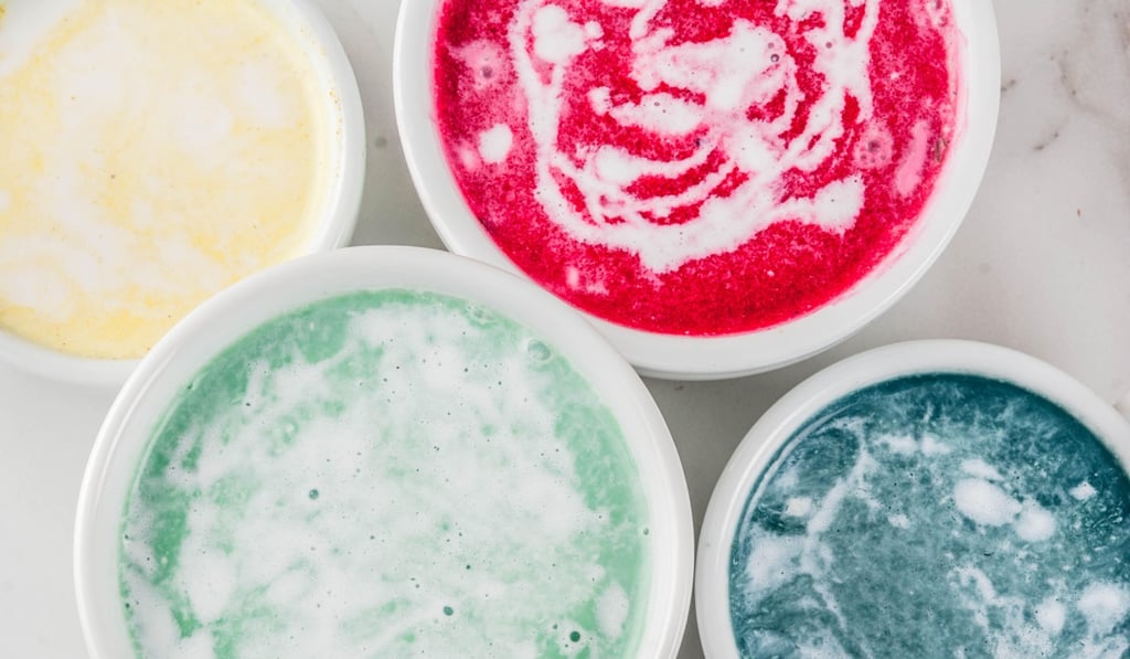 Coffees can come with all kinds of colourful and healthy additions. These organic vegan lattes each have one of turmeric, beetroot, seaweed and matcha added to them. Photo: Alamy