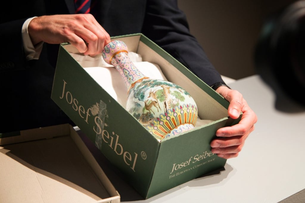 The Chinese vase, pictured in a shoebox, which is believed to have been made for the Qianlong Emperor in the 18th century.