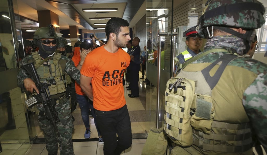 The Israeli men were arrested ‘while in the act of managing, operating and manning the three target building’. Photo: AP The Israeli men were arrested ‘while in the act of managing, operating and manning the three target building’. Photo: AP