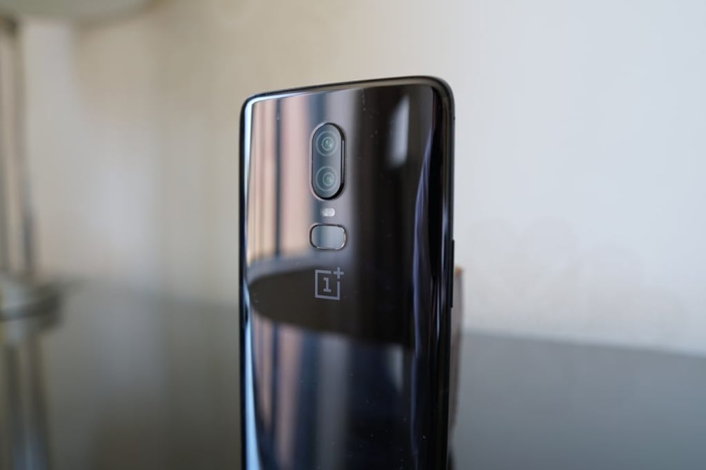 The OnePlus 6 has a glass back with either a reflective black finish, as seen in this photo, or a matte black or white finish. Photo: Ben Sin