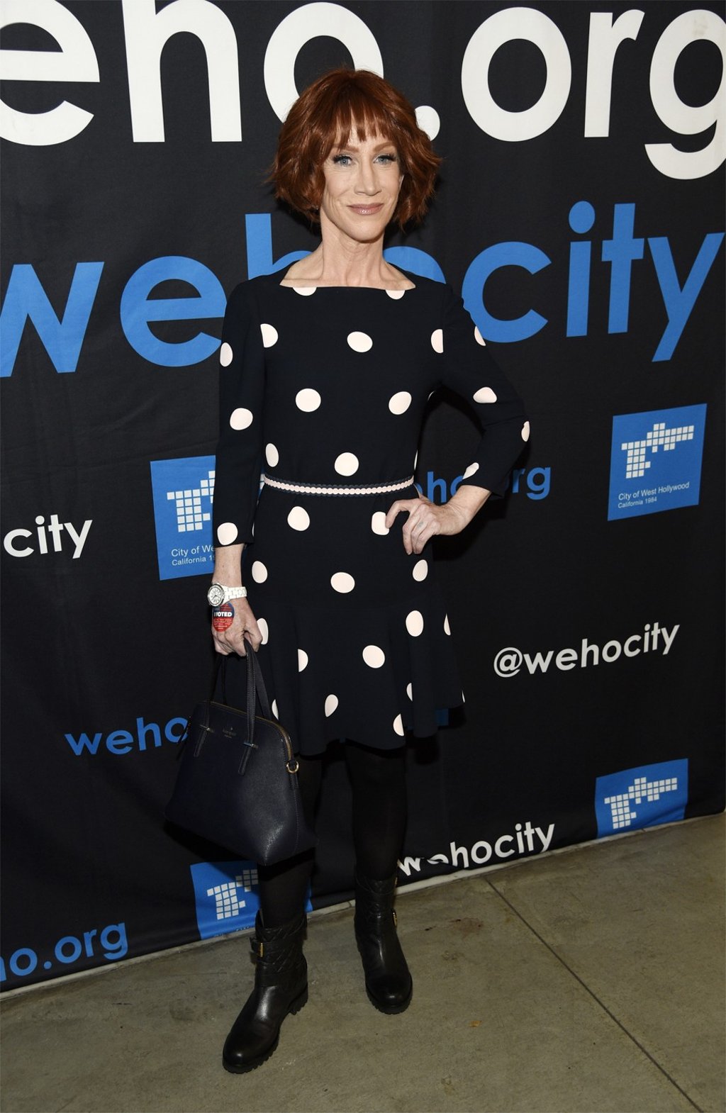 Comedian Kathy Griffin shows off her Kate Spade handbag and dress at an awards ceremony in Hollywood on Tuesday, hours before Spade was found dead. Photo: Chris Pizzello/Invision/AP Comedian Kathy Griffin shows off her Kate Spade handbag and dress at an awards ceremony in Hollywood on Tuesday, hours before Spade was found dead. Photo: Chris Pizzello/Invision/AP