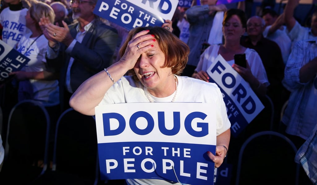 A supporter of Progressive Conservative (PC) leader Doug Ford reacts during his election night party in Toronto. Photo: Reuters
