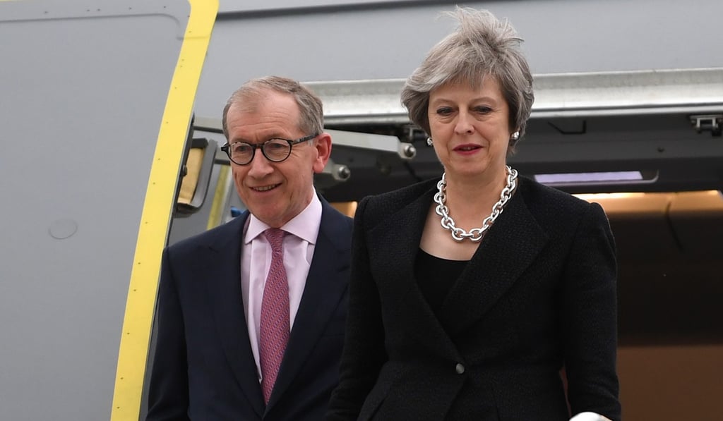 British Prime Minister Theresa May and her husband Phillip arrive at CAF Bagotville ahead of the G7 summit in Charlevoix in Canada on Friday. Photo: EPA-EFE