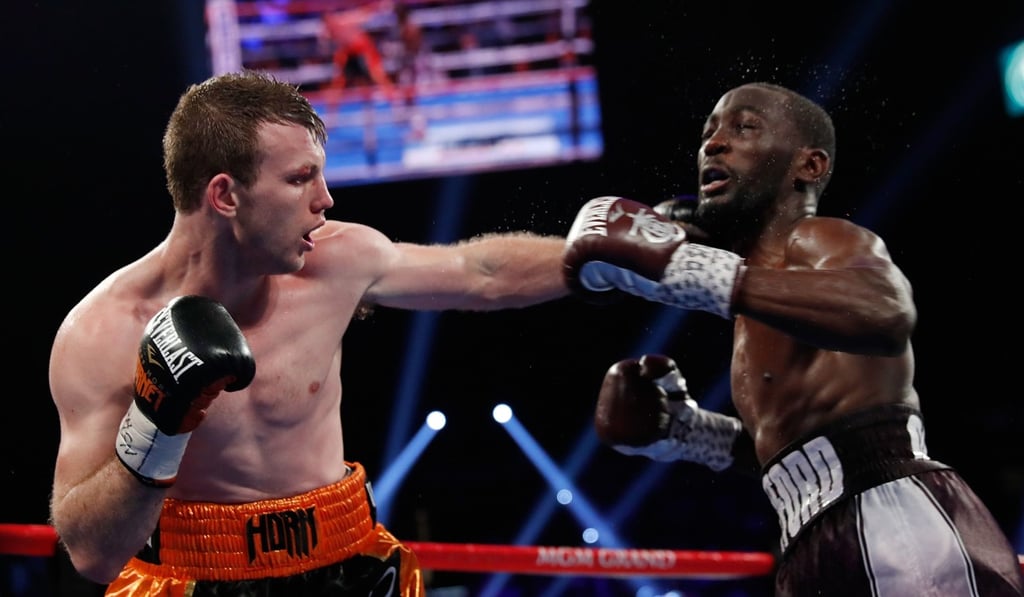 Jeff Horn hits Terence Crawford with a left in the fifth round. Photo: AFP