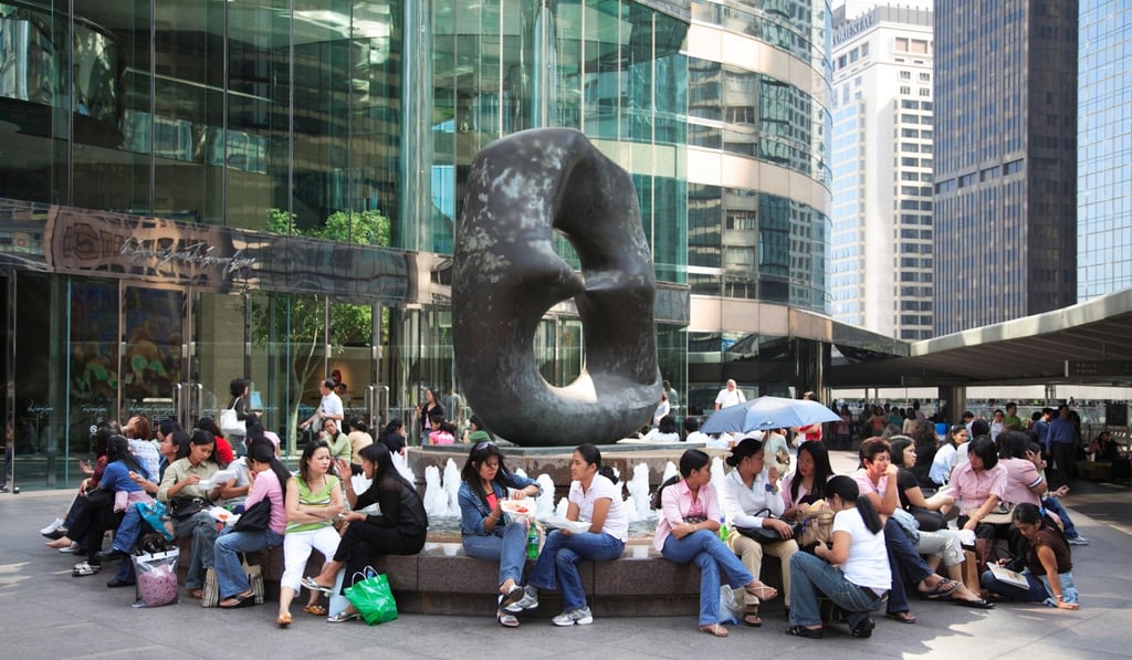 Domestic Helpers gather in Exchange Square, Central, on one of their weekly days off. Photo: Handout
