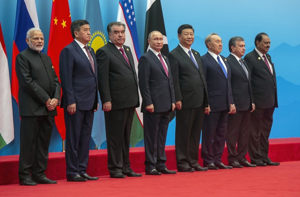 The leaders of the Shanghai Cooperation Organisation countries gather for a photograph ahead of their talks on Sunday in Qingdao, eastern China’s Shandong province. Photo: AP The leaders of the Shanghai Cooperation Organisation countries gather for a photograph ahead of their talks on Sunday in Qingdao, eastern China’s Shandong province. Photo: AP