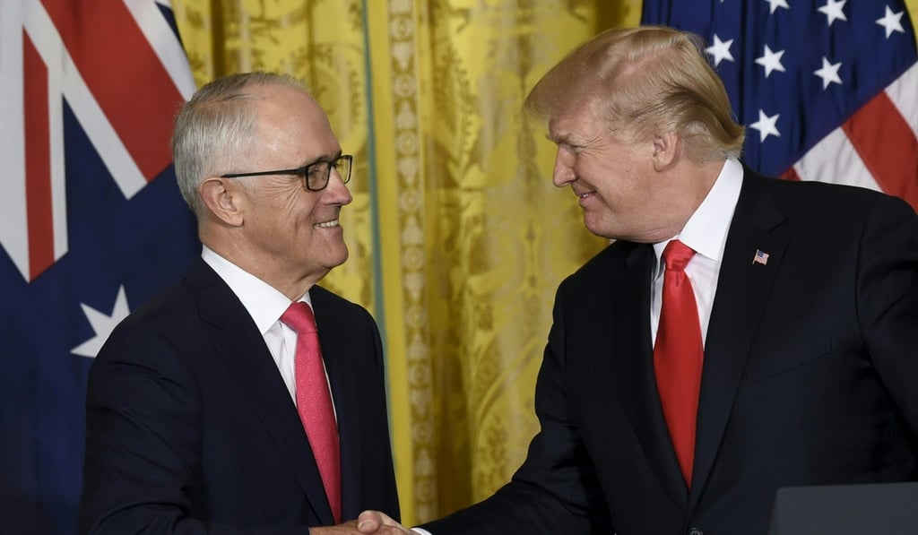 US President Donald Trump and Australian Prime Minister Malcolm Turnbull shake hands ahead of a joint press conference in the East Room of the White House in Washington on February 23. Photo AFP PHOTO