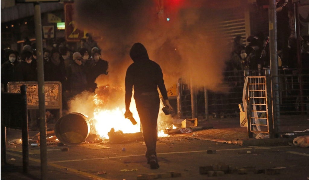 Prosecutors described how the night of chaos began on Portland Street with what appeared to be a scuffle between government hawker control officers and street vendors. Photo: AP