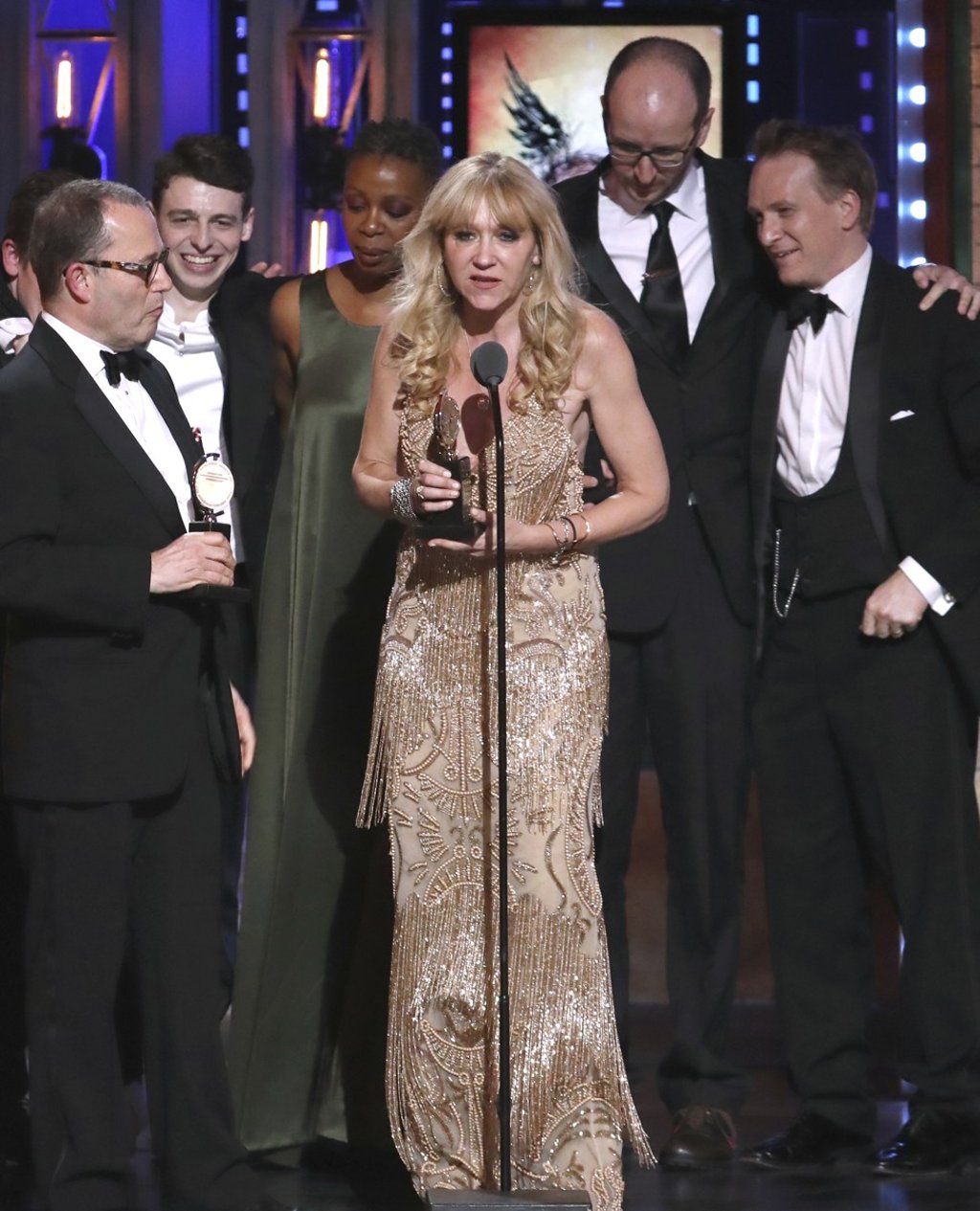 Producer Sonia Friedman (centre) and the cast and crew of ‘Harry Potter and the Cursed Child’ accept the award for best play at Sunday’s Tony Awards at Radio City Music Hall, in New York. Photo: AP
