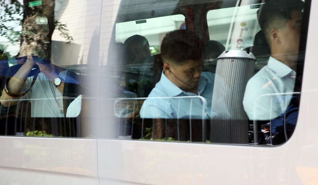 Members of the North Korean security and media delegation. Photo: EPA Members of the North Korean security and media delegation. Photo: EPA