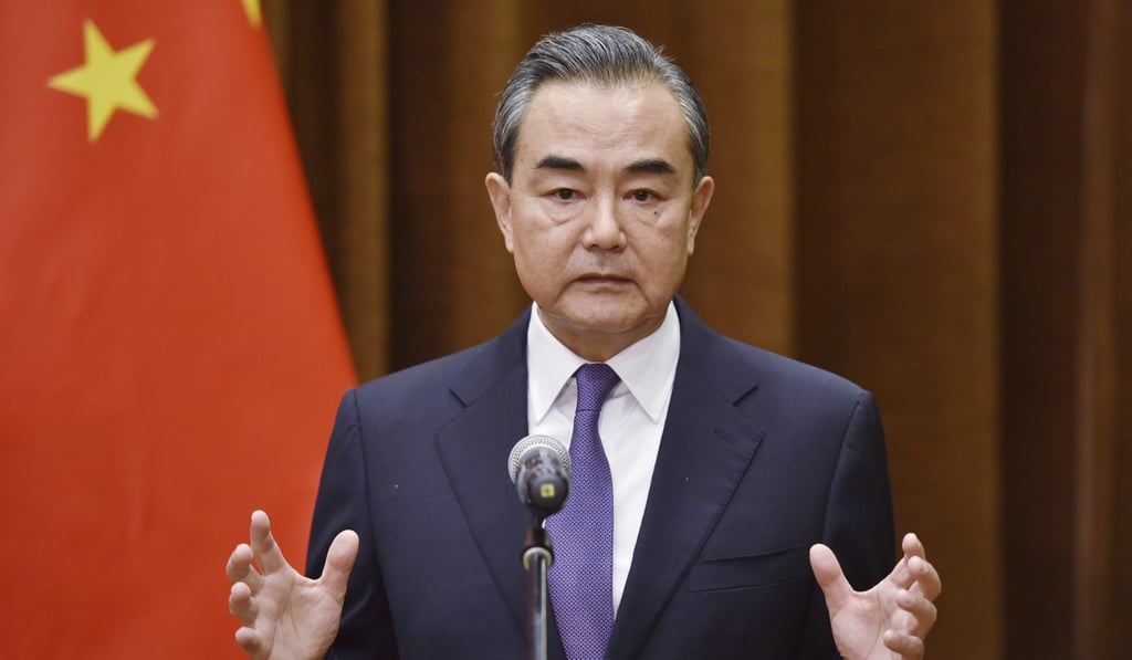 Chinese Foreign Minister Wang Yi speaks about the summit between US President Donald Trump and North Korean leader Kim Jong-un at the Foreign Ministry in Beijing on June 12, 2018. Photo: AP Chinese Foreign Minister Wang Yi speaks about the summit between US President Donald Trump and North Korean leader Kim Jong-un at the Foreign Ministry in Beijing on June 12, 2018. Photo: AP