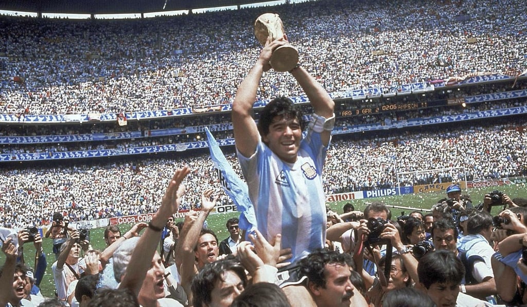 Diego Maradona lifts the 1986 World Cup after Argentina defeat West Germany 3-2 in the final at Atzeca Stadium, Mexico City. Photo: AP