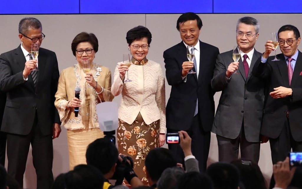 (Left to right): Hong Kong’s Financial Secretary Paul Chan; Hong Kong Exchanges and Clearing (HKEX) chairman Laura Cha; chief executive of Hong Kong, Carrie Lam; chief executive of HKEX, Charles Li, attends the Stock Exchange of Hong Kong's 18th Anniversary Cocktail Reception on June 13, 2018. Photo: Nora Tam