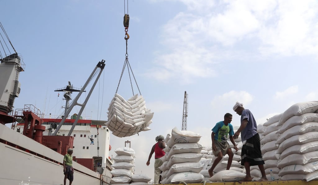 Workers unload food aid provided by Unicef from a cargo ship in war-torn Yemen’s main port of Hodeida in January. Photo: AFP