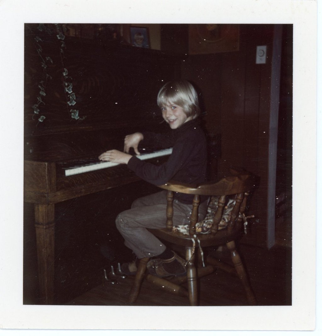 The late Kurt Cobain, pictured playing the piano aged eight in 1975, in a photograph that will form part of an exhibition of his personal items at Museum of Style Icons in Newbridge, Ireland. Photo: Cobain Family Archive/Reuters