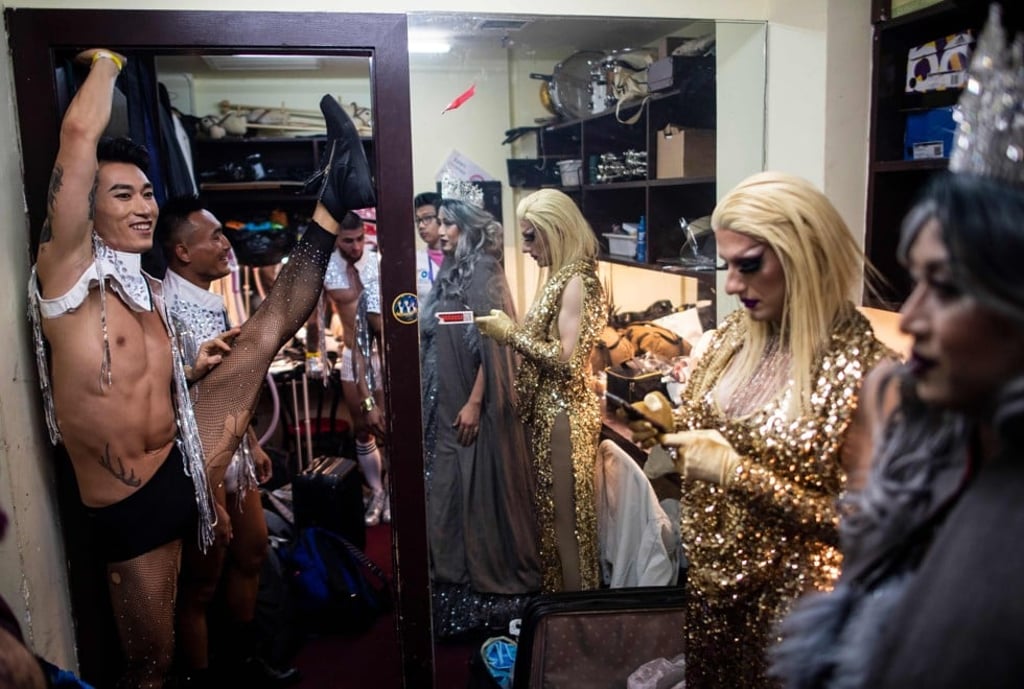 Performers wait backstage for a show at the Shanghai Pride opening party on Saturday. Photo: AFP