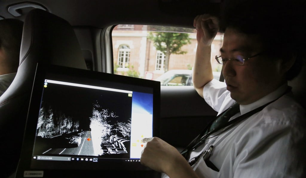 A car monitor shows a 3D digital map as it's driven through Tokyo streets. Technology companies are racing to develop ultra-precise three-dimensional digital maps that can guide self-driving cars to within inches of where they are supposed to be. Photo: AP A car monitor shows a 3D digital map as it's driven through Tokyo streets. Technology companies are racing to develop ultra-precise three-dimensional digital maps that can guide self-driving cars to within inches of where they are supposed to be. Photo: AP