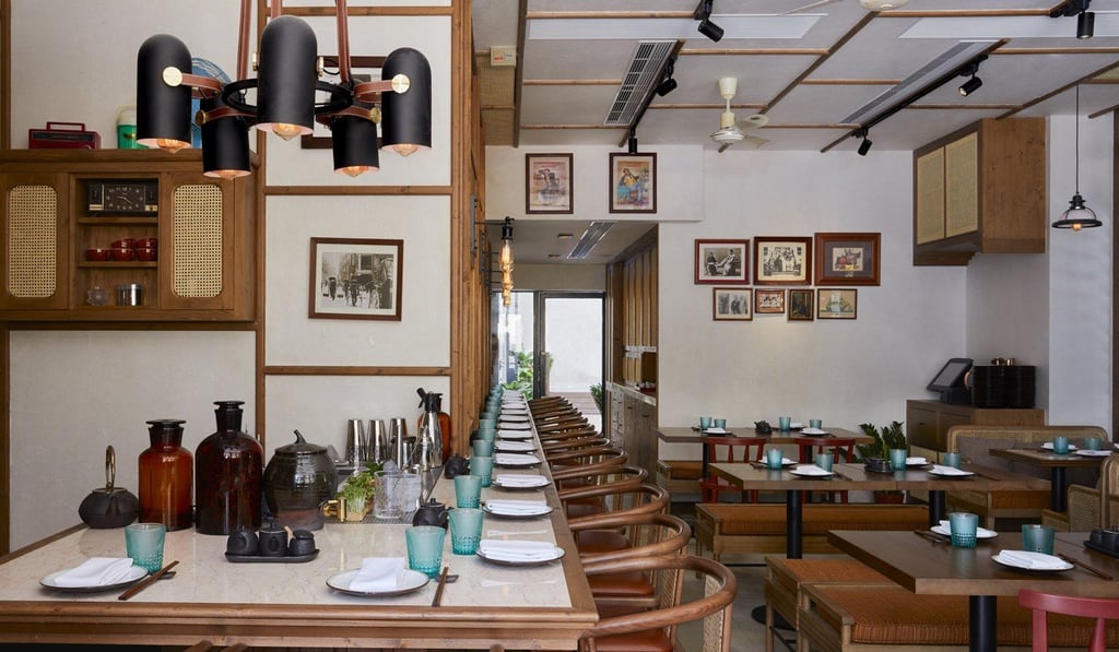 The glass-fronted kitchen at Madame Ching creates a welcoming atmosphere that is ideal for socialising.