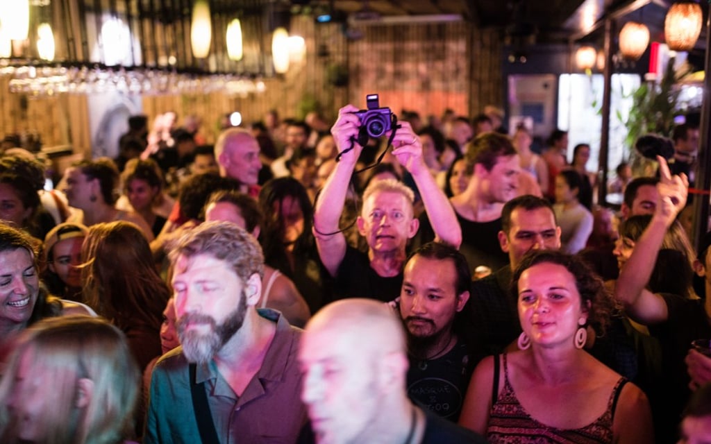 The crowd gets into a Kampot Playboys show in Phnom Penh. Photo: Steve Porte The crowd gets into a Kampot Playboys show in Phnom Penh. Photo: Steve Porte
