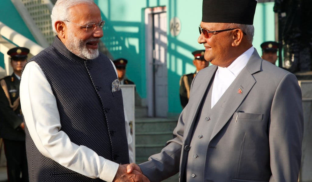 Indian Prime Minister Narendra Modi with his Nepalese counterpart Khadga Prasad Sharma Oli in Kathmandu, Nepal. Photo: Reuters