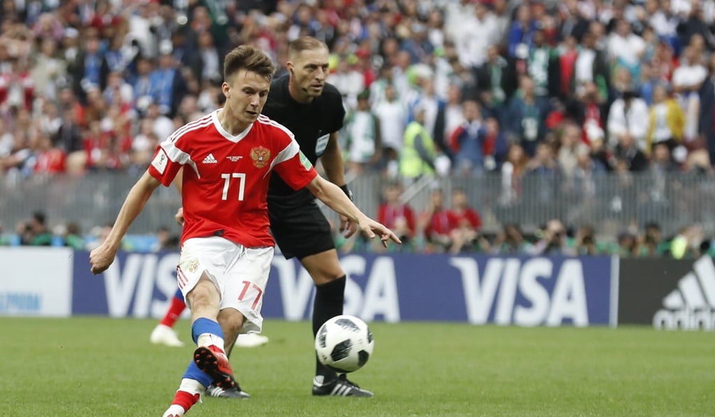 Russia’s Alexander Golovin scores his sides fifth goal from a direct free kick. Photo: AP