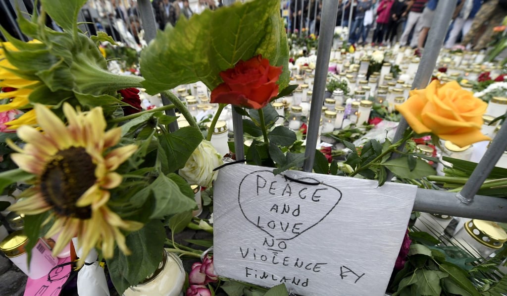 File photo of candles and flowers placed to commemorate the victims of the stabbing spree in Turku Market Square. Photo: Reuters