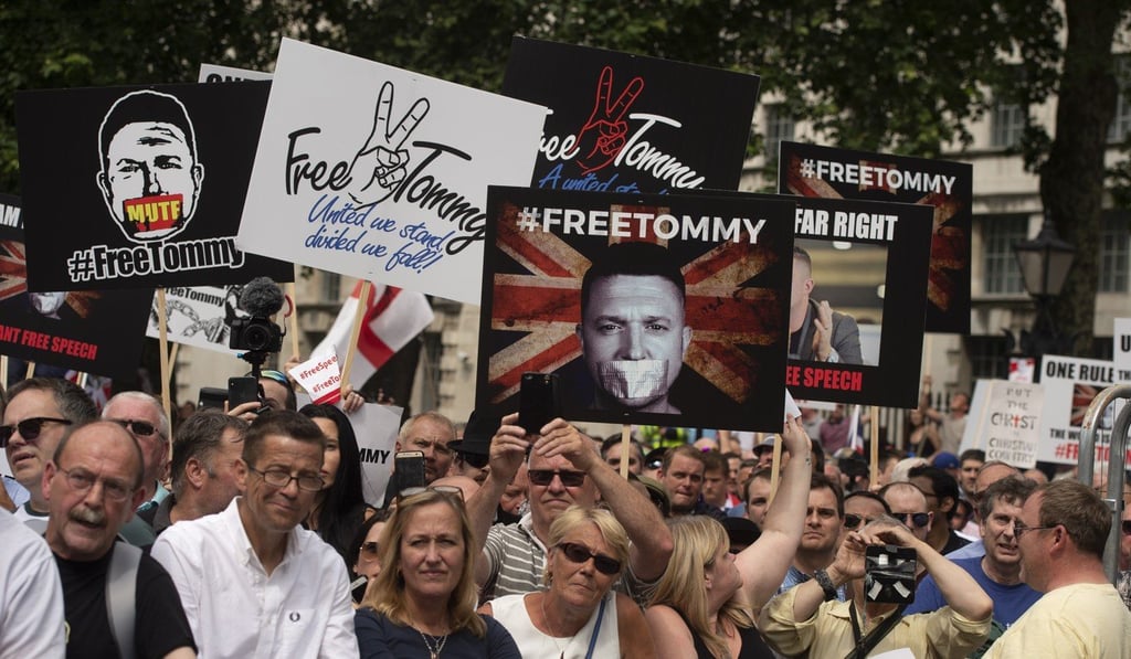 Protesters take part in a rally in support of British far-right campaigner Tommy Robinson, in Whitehall, central London. Photo: EPA Protesters take part in a rally in support of British far-right campaigner Tommy Robinson, in Whitehall, central London. Photo: EPA