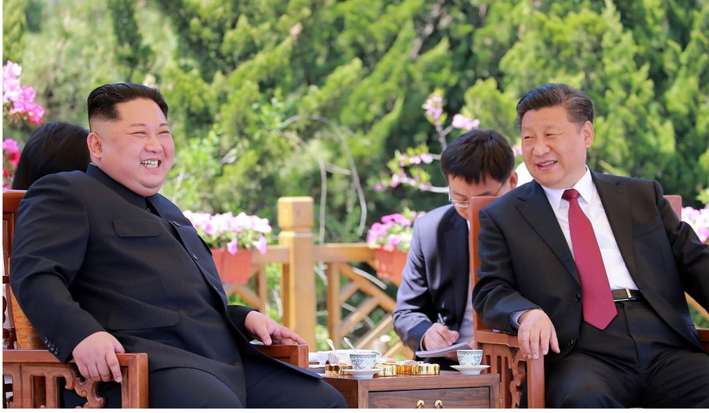 North Korean leader Kim Jong-un and Chinese President Xi Jinping in the Chinese city of Dalian. Photo: AFP
