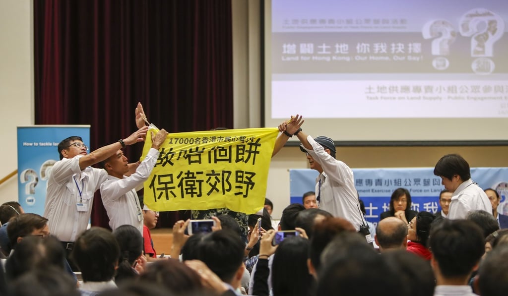 The event drew activists, who unfurled this banner to express their views. Photo: Winson Wong