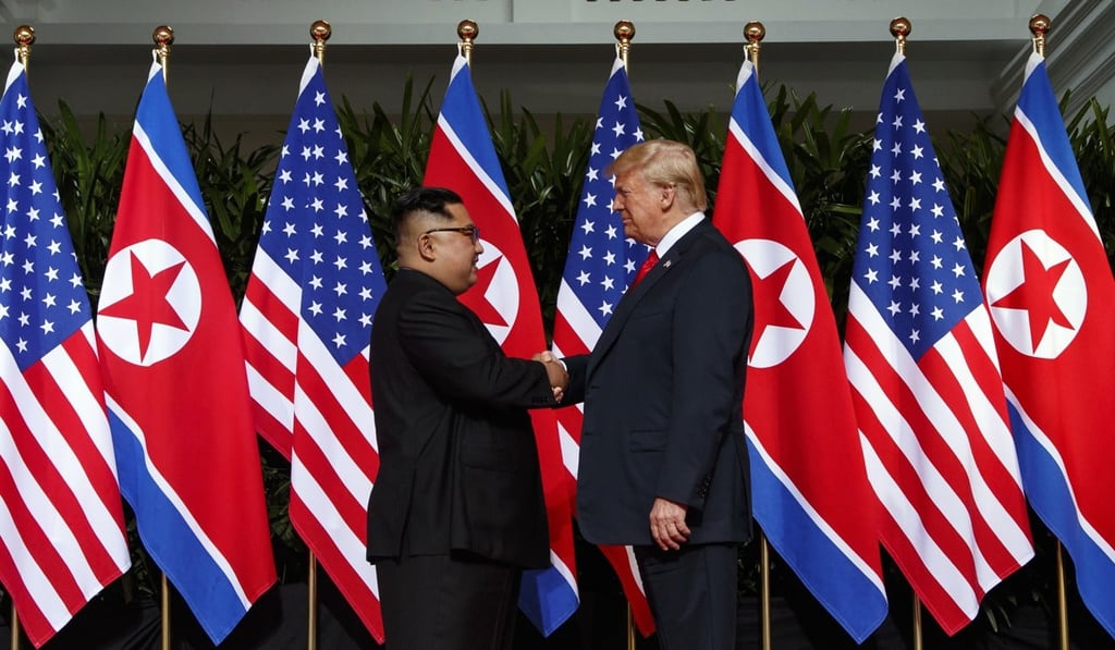 In this Tuesday, June 12, photo, North Korean leader Kim Jong-un, left, and US President Donald Trump shake hands at their meeting on Sentosa Island in Singapore. Photo: AP In this Tuesday, June 12, photo, North Korean leader Kim Jong-un, left, and US President Donald Trump shake hands at their meeting on Sentosa Island in Singapore. Photo: AP