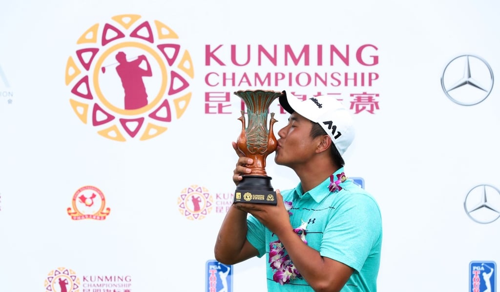 Hong Kong's Motin Yeung kisses the trophy. Hong Kong's Motin Yeung kisses the trophy.