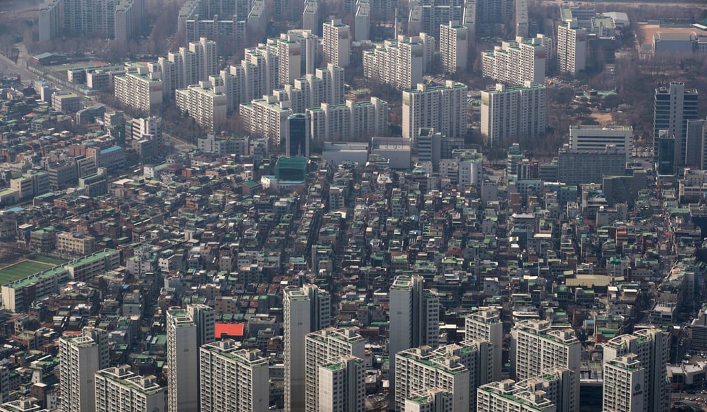 Apartments and houses seen from the observation deck of the World Tower in Seoul, South Korea. Photo: Bloomberg