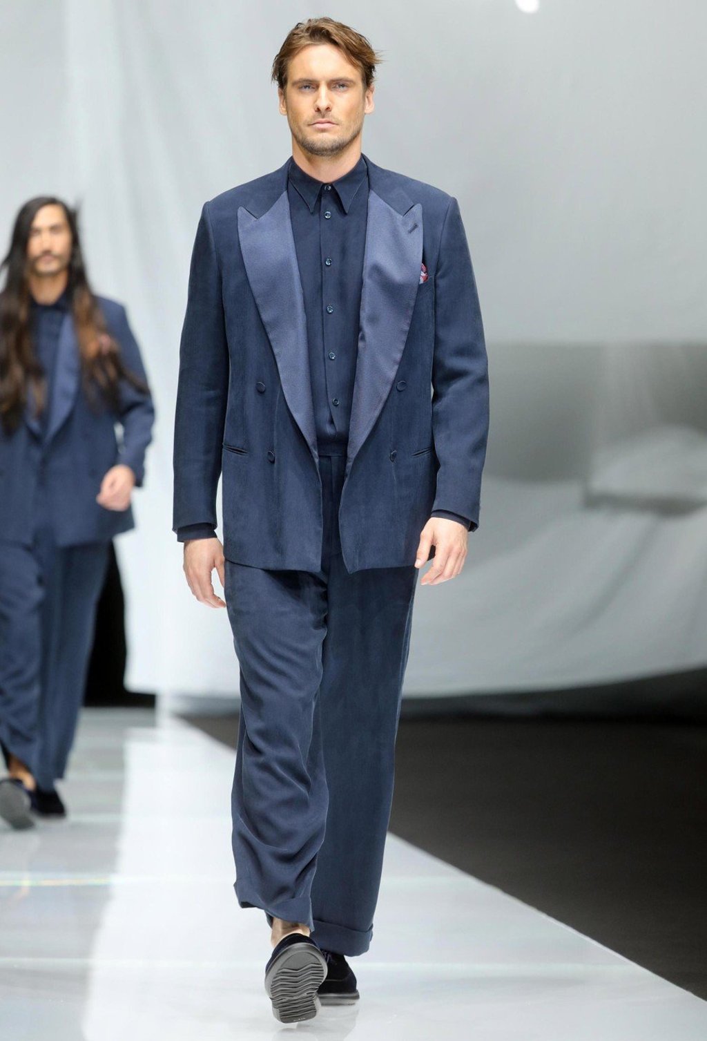 Models present Giorgio Armani’s creations during the Milan Men's Fashion Week. Photo: EPA