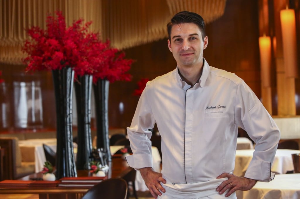 Pastry chef Michael Pretet offers a savoury transition course on his menu at Amber. Photo: Edmond So