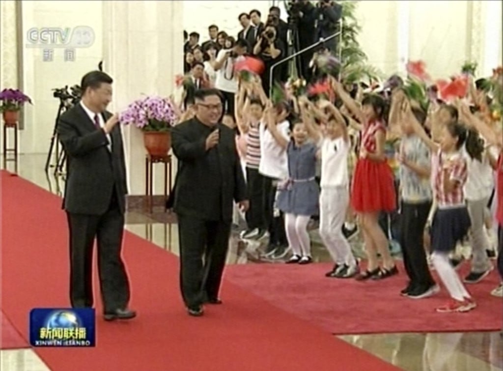 Chinese President Xi Jinping (left) told Kim Jong-un that Beijing will continue to support Pyongyang’s economic development efforts “regardless of the changes in regional and international situations”. Photo: AP Chinese President Xi Jinping (left) told Kim Jong-un that Beijing will continue to support Pyongyang’s economic development efforts “regardless of the changes in regional and international situations”. Photo: AP