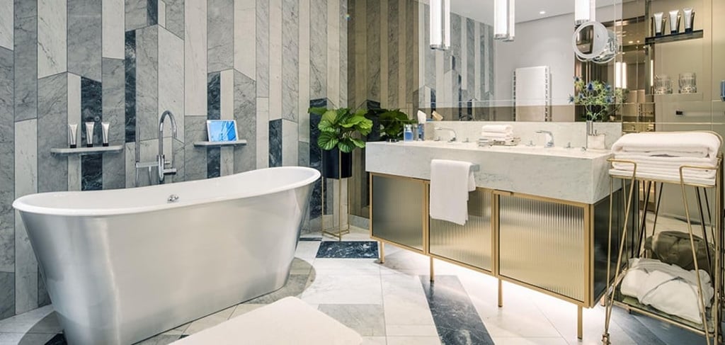 The bathroom inside the grand suite is visually striking. The bathroom inside the grand suite is visually striking.