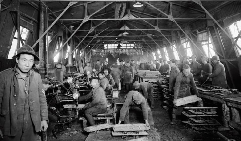 Chinese riveters at work at the Tank Corps central workshop during the first world war. A contingent of Chinese workers arrived in France to help the Allied war effort on August 24, 1916. By the time the war ended in 1918, their numbers had grown to more than 140,000. Photo: Australian War Memorial
