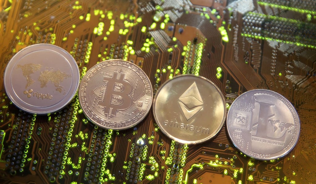 Representations of the Ripple, bitcoin, Ethereum and Litecoin digital currencies. More than US$1 billion in thefts have hit the cryptocurrency sector. Photo: Reuters