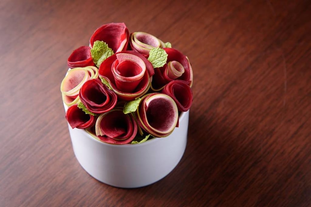 Buttercups carob and mascarpone cream with Sambuca infused beetroot and apple at La Scala.