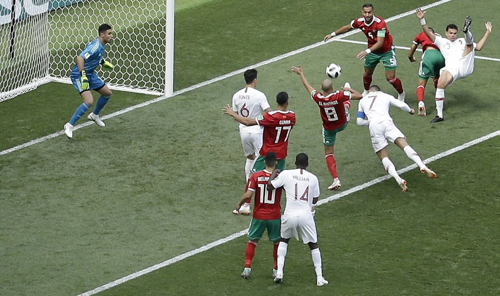 Ronaldo heads the ball to score the winning goal against Morocco. Photo: AP Ronaldo heads the ball to score the winning goal against Morocco. Photo: AP