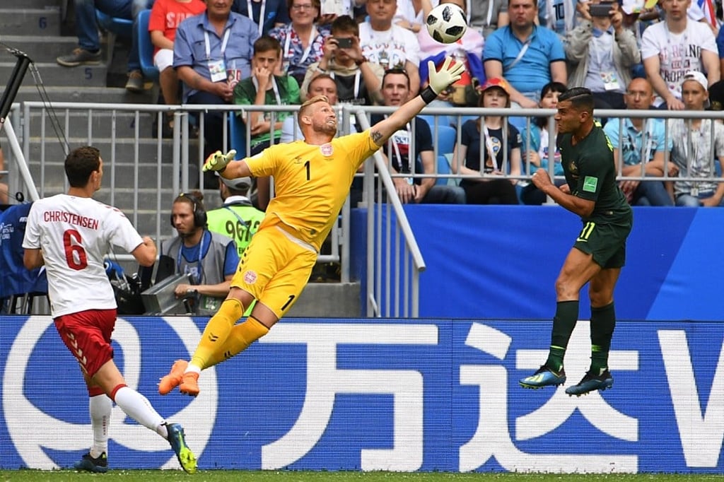 Wanda pitch signage at Denmark versus Australia. Photo: AFP Wanda pitch signage at Denmark versus Australia. Photo: AFP