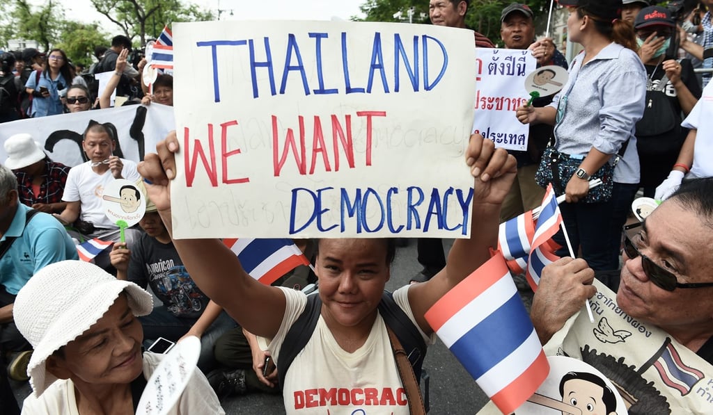 Demonstrators outside Thammasat University in Bangkok at a protest to mark four years of junta rule. Photo: AFP