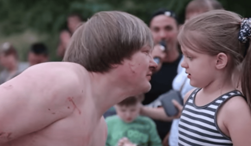 The ‘myzhik’ kisses his daughter. ‘Your daddy can do anything’, says the announcer. The ‘myzhik’ kisses his daughter. ‘Your daddy can do anything’, says the announcer.